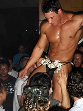 male exotic dancer with lots of dollars